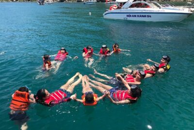 Cham Island Snorkeling Daily Group Tour, Sunbathing, nice beaches - Stone carving stop at Non Nuoc: a short culture warm-up