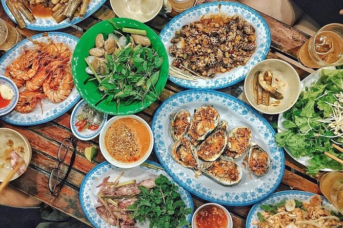 Da Nang By Night: Seafood dinner, night market and cruise trip - Dragon Bridge at night: the big “wow” stop and why select-day shows matter