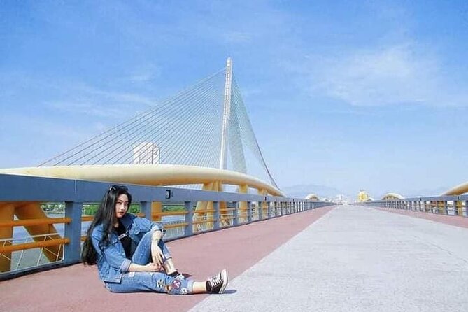 Da Nang City Tour Motorbike/Scooter & Sightseeing By Lady Rider - APEC Park: kite-shaped building views over the river