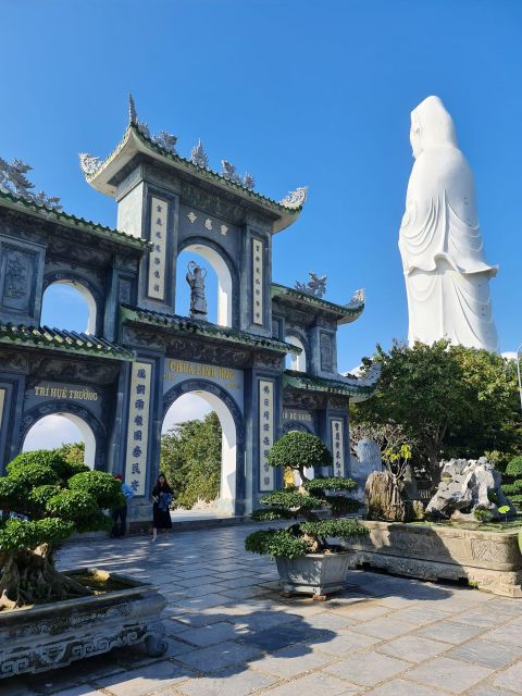 Da Nang: Lady Buddha, Marble Mountains, and Am Phu Cave Tour - Marble Mountains: steps, tunnels, and the feeling of moving through the mountain