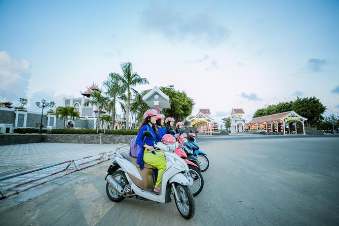 Da Nang Night Motorbike Tour & River Cruise Riding By Lady Rider - From pickup to Dragon Bridge: start with Da Nang’s main show