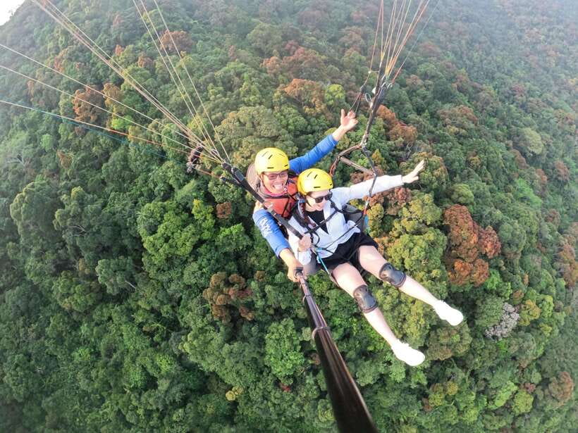 Da Nang Private paragliding experience on Monkey Mountain - The Flight Itself: Ocean Air, City Views, Temples, and Fishing Village Landings