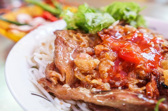 DaNang Night Foodie Tour-Sighseeing with Aodai Lady Rider Private - Key highlights worth planning around