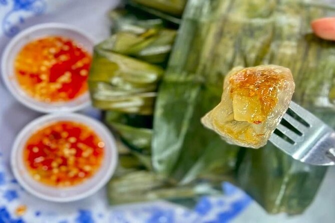 DaNang Night Foodie Tour-Sighseeing with Aodai Lady Rider Private - Night and flower markets: the best way to start your Da Nang evening