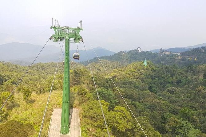 GOLDEN BRIDGE BA NA HILLS - CABLE CAR & Da Nang City PRIVATE TOUR - Marble Mountains: elevator access, caves, and Buddhist temples
